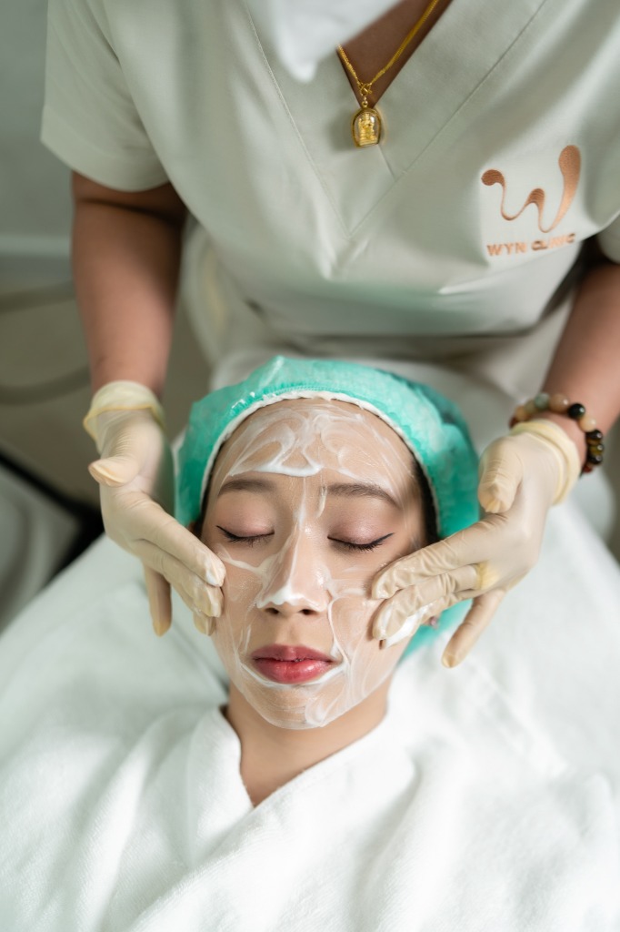 Spa facial treatment in progress captured as clean, editorial medical and wellness coverage